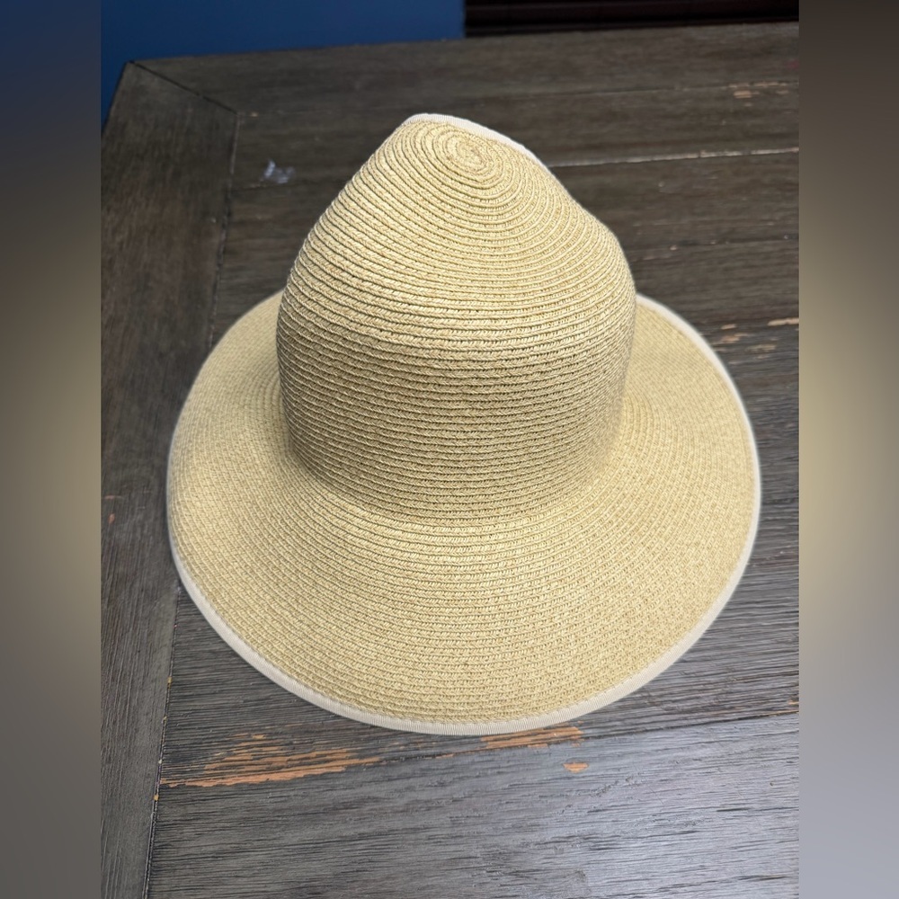 Scala natural woven sun  floppy hat with a beige bow and UPF 50+ sun protection